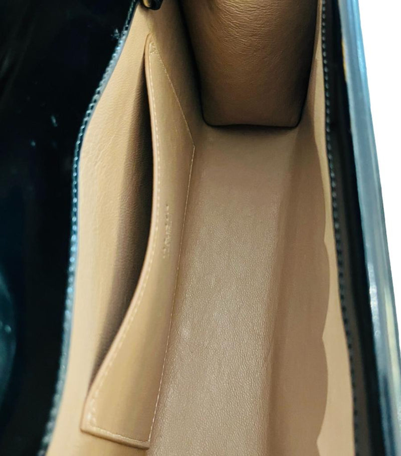 Alaia Studded Leather Clutch Bag