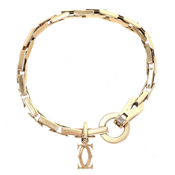 Cartier 18k Gold Agrafe Bracelet With Cartier Logo Charm