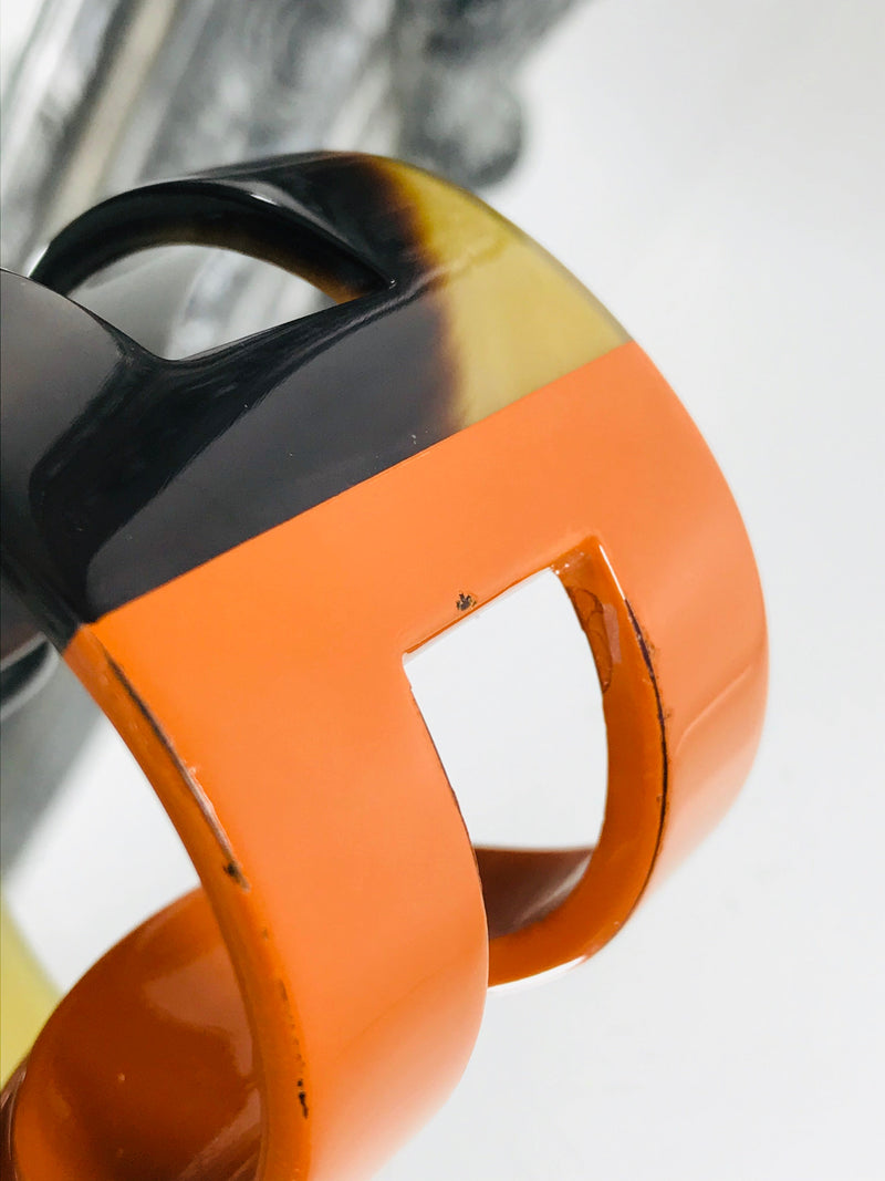 Hermes Buffalo Ano H Cuff Bracelet Lacquered Orange And Beige/Black Shush At The Wellington St Johns Wood London Buy Sell Consign Preloved Authentic Luxury Designer Ladies Jewellery And Accessories 