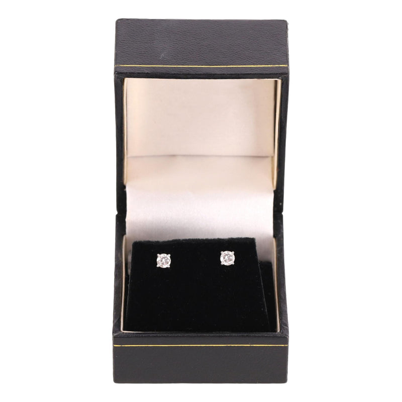 Diamond Solitaire Earrings Set In Platinum