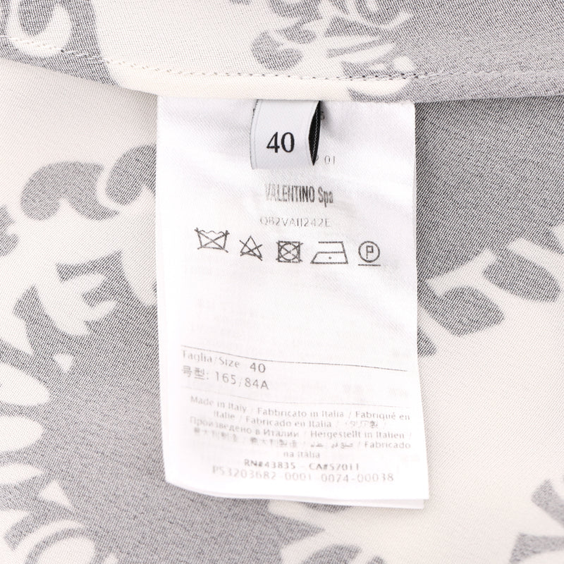 Valentino Logo Printed Silk Dress With Asymmetric Sleeves. Size 40IT