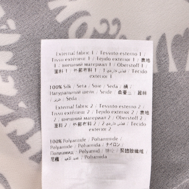 Valentino Logo Printed Silk Dress With Asymmetric Sleeves. Size 40IT