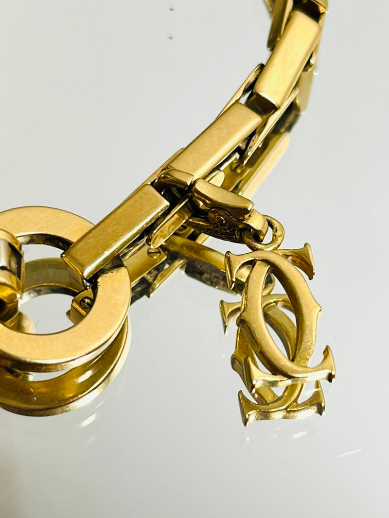 Cartier 18k Gold Agrafe Bracelet & Logo Charm