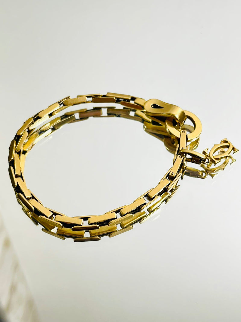 Cartier 18k Gold Agrafe Bracelet & Logo Charm